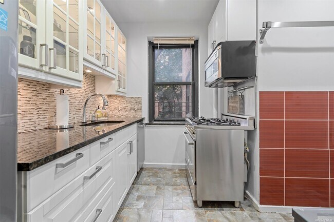 Building Photo - 34-41-41 78th St
