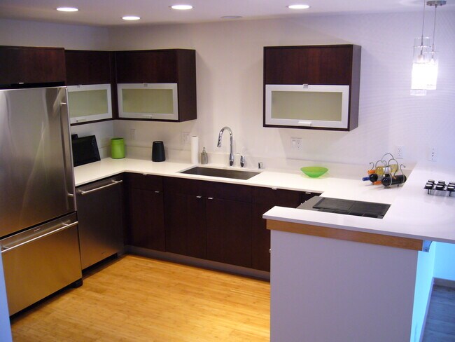 Kitchen with quartz counters & SS appliances - 566 Galer St