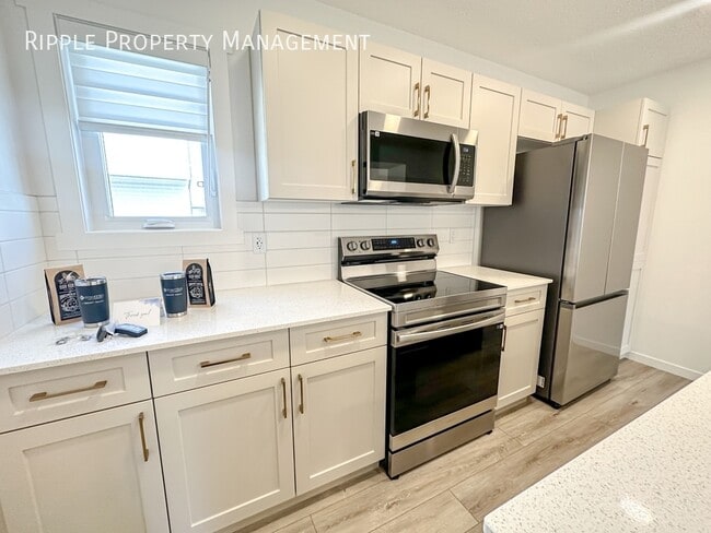 Building Photo - 50% OFF YOUR FIRST MONTHS RENT! AMAZING BR...