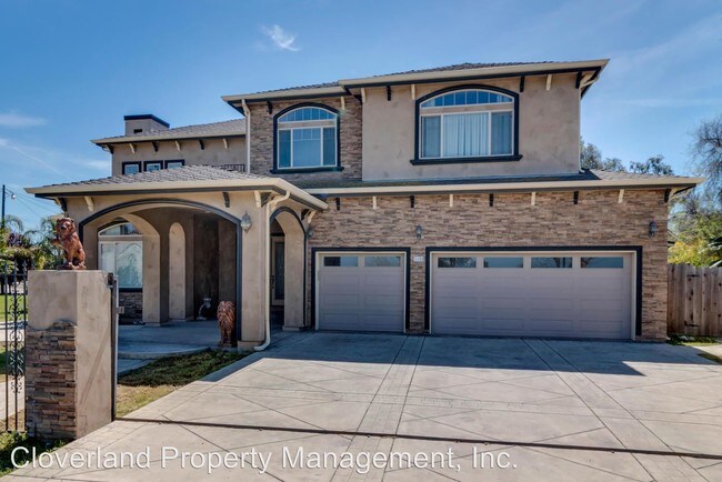 Building Photo - 5 br, 3.5 bath House - 5590 W. Grant Line Rd.