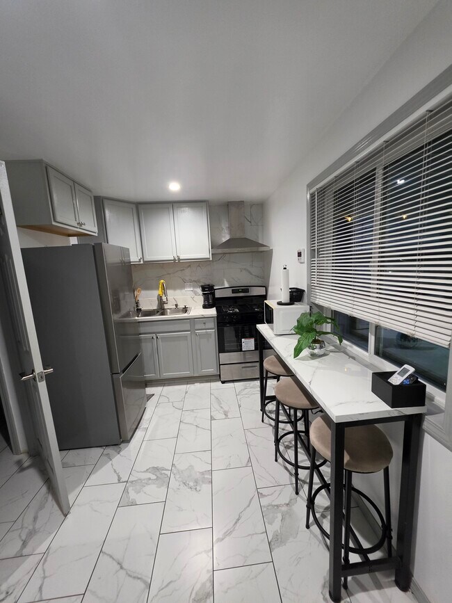 Kitchen/ living room - 124 E 135th St