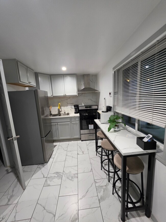 Kitchen/ living room - 124 E 135th St