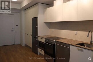 Building Photo - 50A-1750 Charles St E