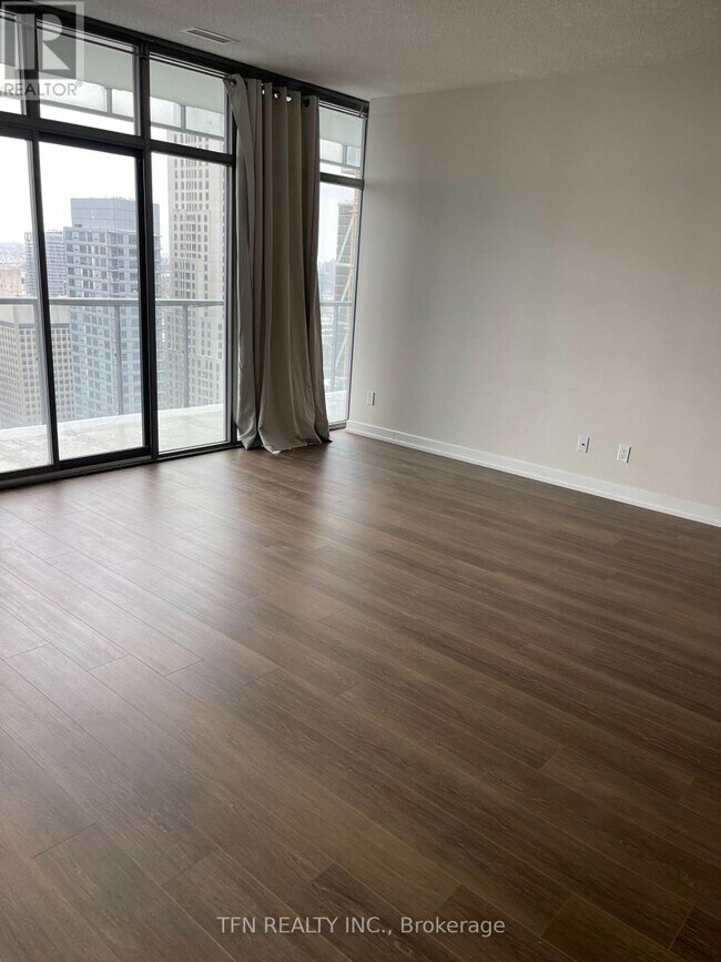 Building Photo - 33 Charles St E