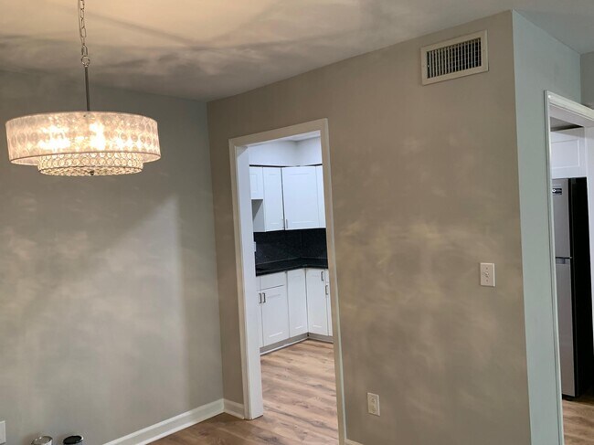 Dining room is just off the kitchen. - 7113 Quail Meadow Ln