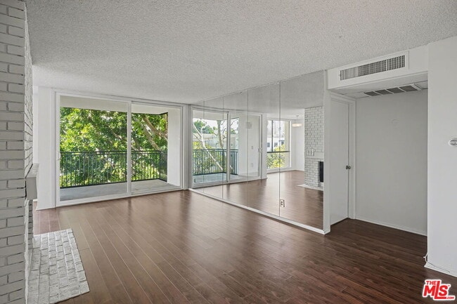 Building Photo - 1340 S Beverly Glen Blvd