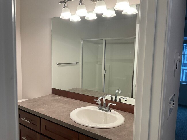 Building Photo - Riverfront Townhome with Tandem Garage & Fenced Yard