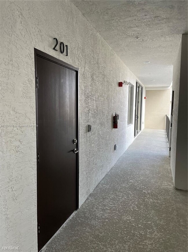Building Photo - 3 br, 2 bath House - 8167 NW 41st St # E-201