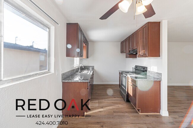 Building Photo - Spacious and Welcoming Two Bedroom with Lo...
