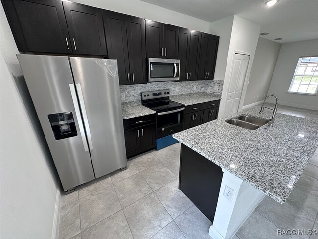 Building Photo - 7145 N Heritage Dr