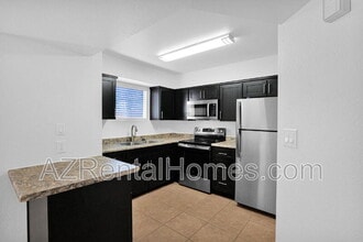 Building Photo - 1712 E Pepper Cir