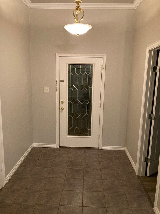 Vestíbulo con armario para abrigos y despacho. - 16485 County Road 164