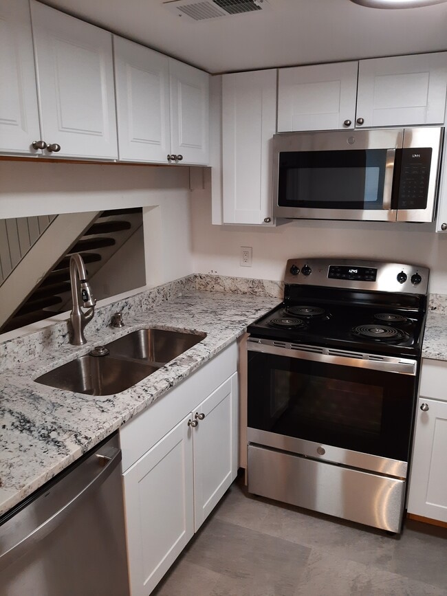 New kitchen - 9901 E Evans Ave