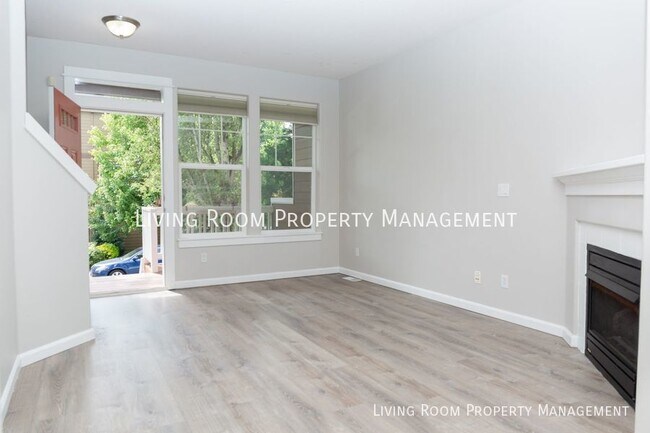 Building Photo - Modern Townhome with an Attached Garage & ...