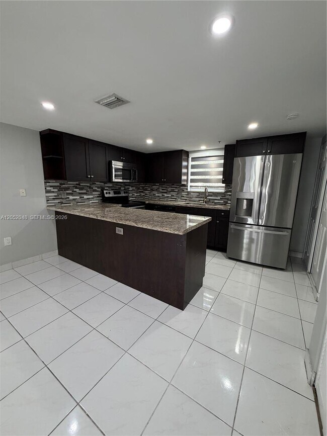 Building Photo - 551 NW 82nd Ave