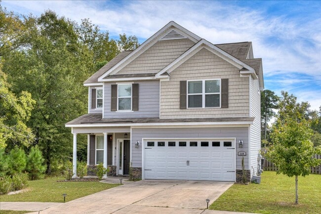 Foto del edificio - 4 bed, 2.5 bath home on corner lot with 2 car garage and fenced in back yard