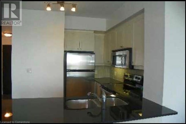 Building Photo - 50 Absolute Ave