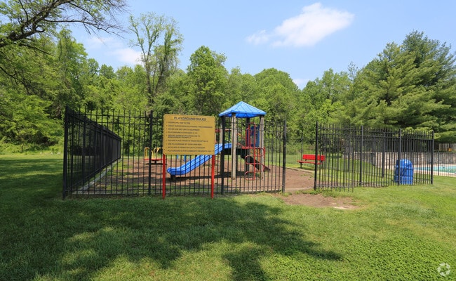 Building Photo - Woods at Addison