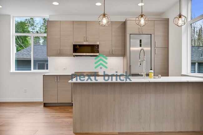 Building Photo - Charming 2-Bed, 2-Bath Townhouse Retreat in Seattle's Vibrant Heart – 1100 Sq Ft of Modern Living!
