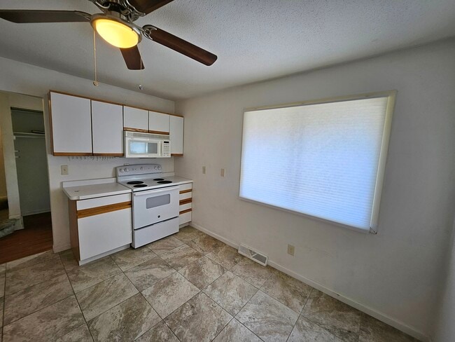 Kitchen has large window & room for table if desired. - 2353 Mailand Ct E