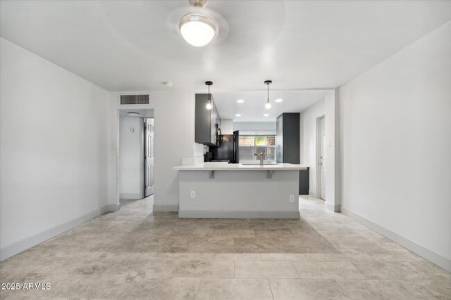 Building Photo - 3641 N 15th Ave