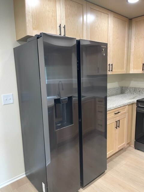 Black Stainless Steel Refrigerator with Ice Maker and Water Dispenser - 436 S Marengo Ave