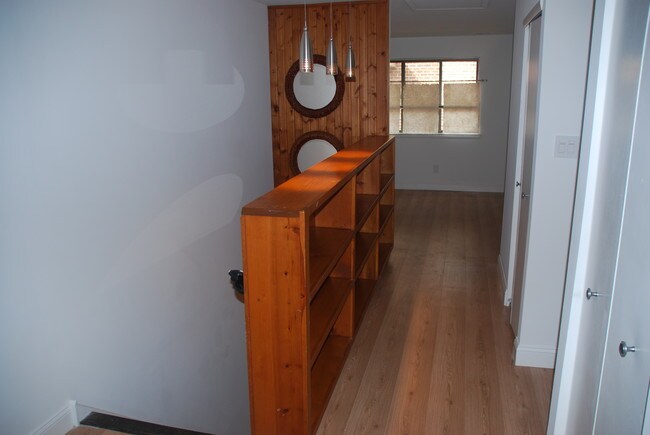 Stairway, bookcase & Den - 103 Cypress Point Circle