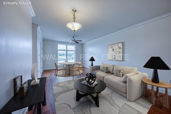 Foto del edificio - 3 BEDROOM CONDO IN RIVER TOWNE - A GATED LAKEFRONT COMMUNITY!!