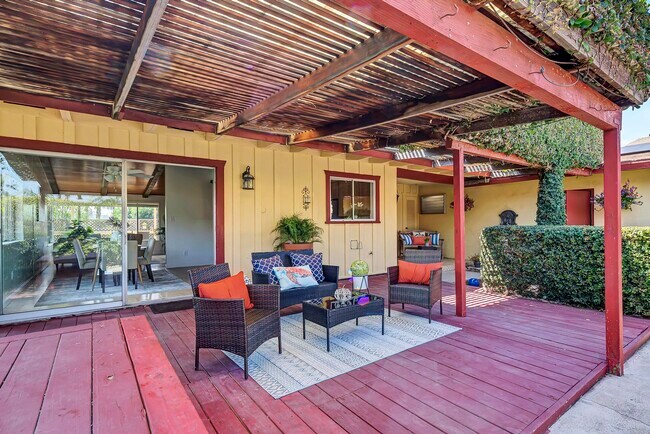 Outdoor living room conversation area. - 8055 Morocco Dr
