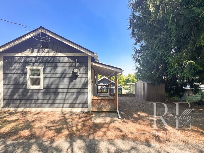 Building Photo - Modern Studio with Full-Size Kitchen Appliances, Covered Porch & Smart Storage