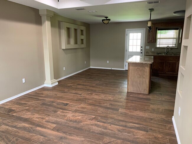 living room to dinning view - 209 W Sugarcane Dr