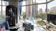 This single-floor residence at 3031 Allen St in Dallas's Uptown neighborhood showcases a contemporary design highlighted by dramatic floor-to-ceiling windows that frame expansive views of the surrounding cityscape. Natural light flows generously throughout, creating a bright and open ambiance across all living areas.

The kitchen is a standout feature, outfitted with rich dark cabinetry, light quartz countertops, stainless steel appliances including a gas range, microwave, and refrigerator, and a large center island with seating. Pendant lighting adds a refined touch above the island, while light hardwood-style flooring extends through the main living areas.

Multiple bedrooms offer well-appointed retreats. The primary bedroom benefits from floor-to-ceiling glass walls with city views, ceiling fan, and direct access to a luxuriously finished en-suite bath featuring dark navy cabinetry, a white quartz vanity, and a frameless glass walk-in shower with tile surround. Additional bedrooms are generously sized with organized closets and neutral carpet flooring.

Secondary bathrooms maintain the same sleek, modern aesthetic with dark cabinetry and clean white countertops. Throughout the residence, a cohesive neutral palette, high-end finishes, and thoughtful layout combine to deliver a polished urban living experience.