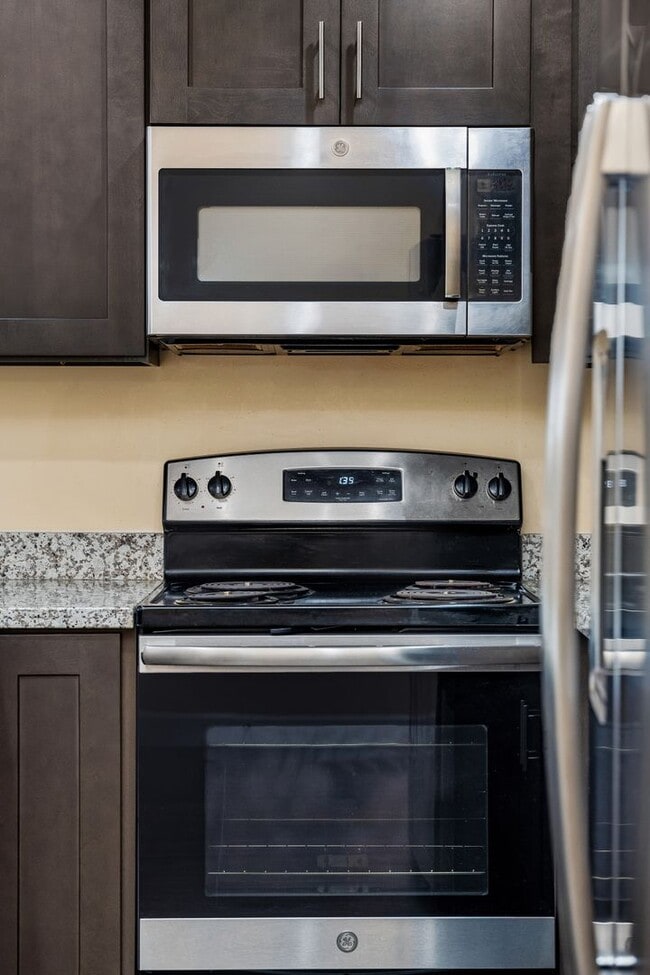 Building Photo - Marigold Apartments - Your Cozy Christmas Home Awaits