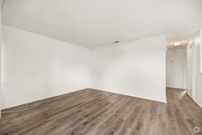 2BR, 2BA - 864 SF - Living Room - Kirby Gardens Apartments