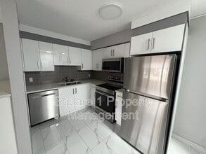 Building Photo - 10725-10785 85 Ave