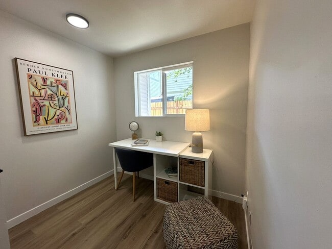 Building Photo - Updated 3-Story Condo with Balconies in So...