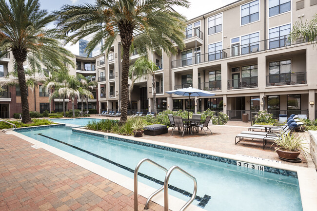 Resort-Inspired Pool with Sun Ledge, Lap Pool, and Waterfall. - The Atlantic Memorial