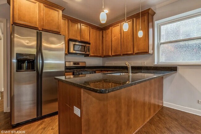 Foto del edificio - 3713 N Kenneth Ave