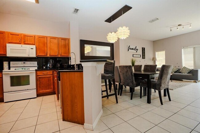 Foto del edificio - 8539 Bay Lilly Loop