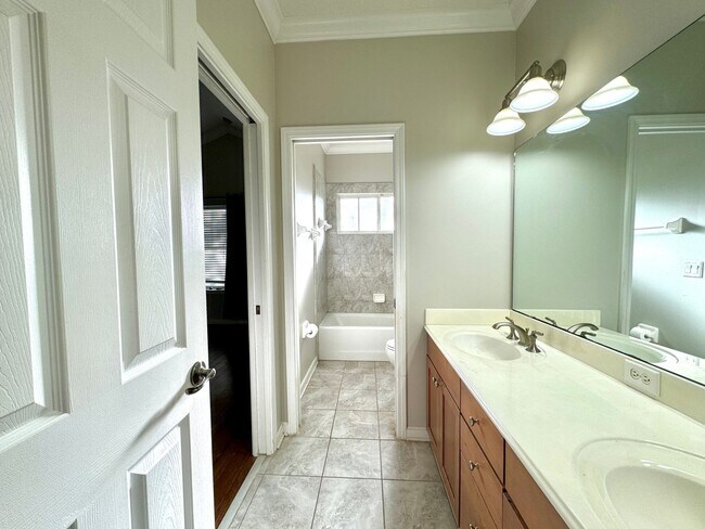 Building Photo - Coastal Charm: Luxurious 4-Bedroom Home in...