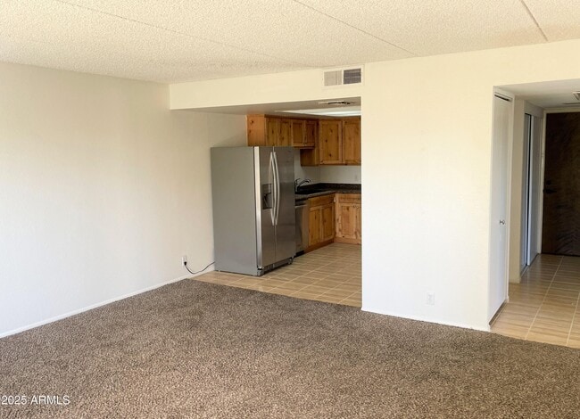 Building Photo - 7910 E Camelback Rd
