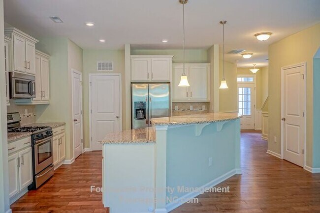 Building Photo - Charming End-Unit Townhome with Bonus Room, Screened Porch & 2-Car Garage – Convenient to RTP, RD...