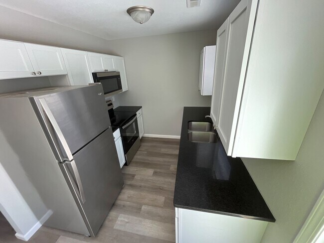 Foto del edificio - 301 W 7th St