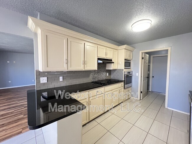 Foto del edificio - 10408 Blue Spruce Rd