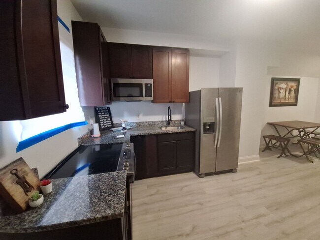 Building Photo - Historic Charm Meets Modern Comfort: 2BR Baltimore Townhouse with Private Yard