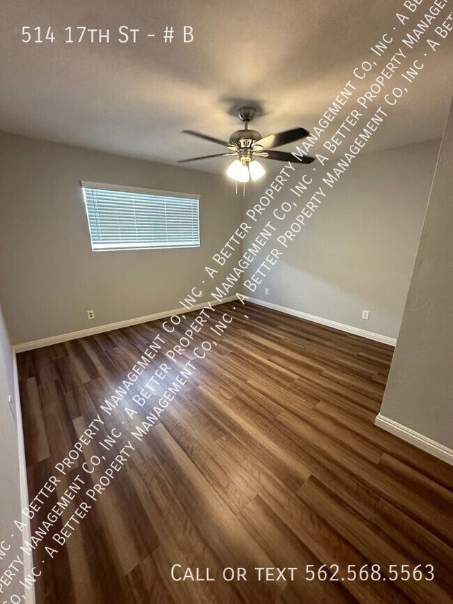 Building Photo - LARGE BACK UNIT W/PATIO - Plank Floors in ...