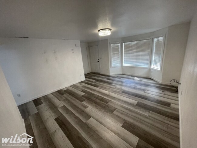Building Photo - 3 Bed, 2 Bath Home with a Two-Car Garage, Fenced Backyard, and Lawn Care Included