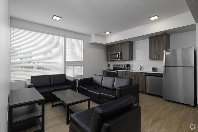 Living Room/Kitchen - Slopeside Village Apartments and Townhomes