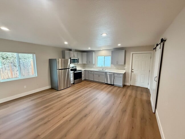 Building Photo - NEW BUILD! Beautifully designed mini home with Solar!!