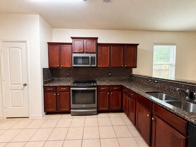 Foto del edificio - 8739 Leclaire Meadow Dr